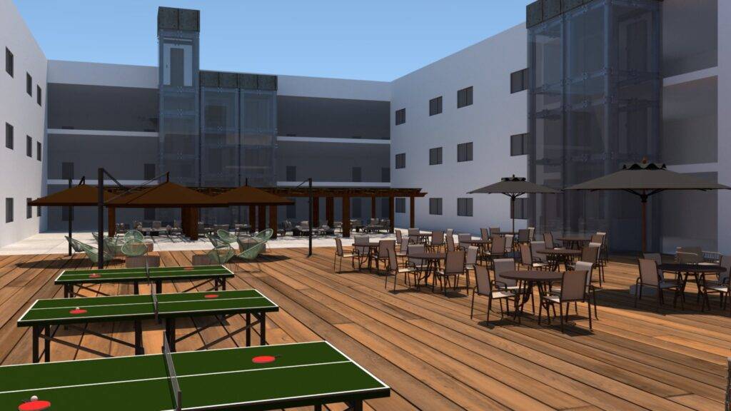 Una área al aire libre con mesas y sillas, sombrillas y mesas de ping pong en un ambiente moderno.