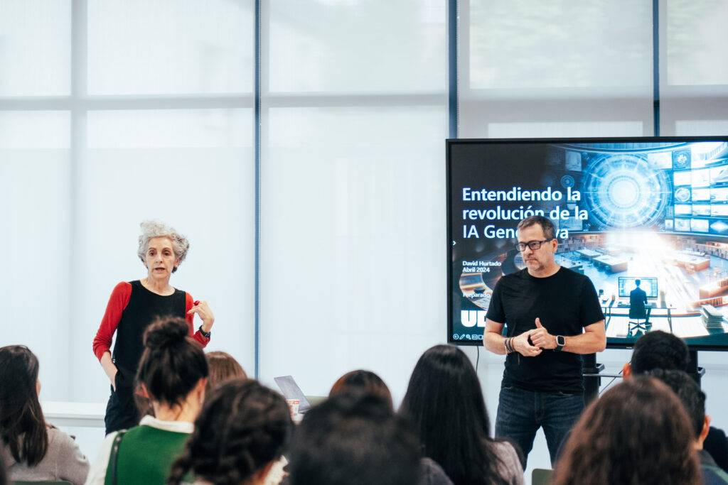 Presentación sobre la revolución de la inteligencia artificial generativa en un evento educativo.