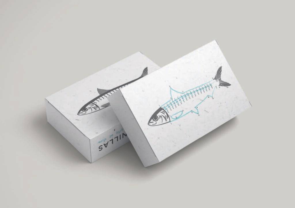 El objeto muestra un diseño de dos cajas con ilustraciones de un pez.