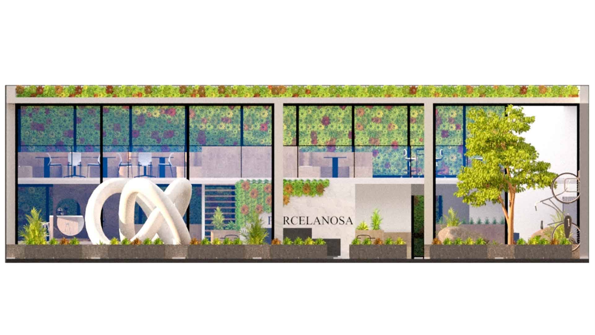 Una fachada moderna con elementos decorativos y vegetación en un entorno urbano.