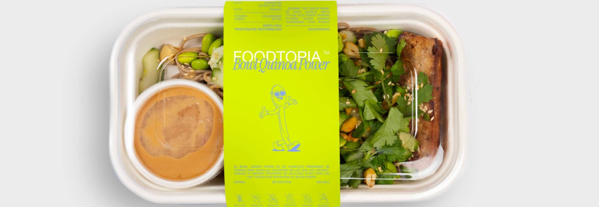 Un plato saludable en un envase biodegradable con una etiqueta colorida.