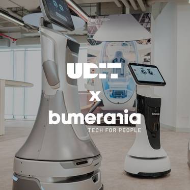 La imagen muestra dos robots en un entorno moderno y tecnológico.