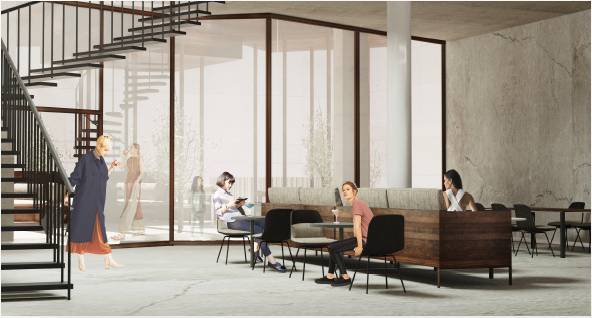 Una moderna cafetería interior con varias personas sentadas y una escalera elegante al fondo.