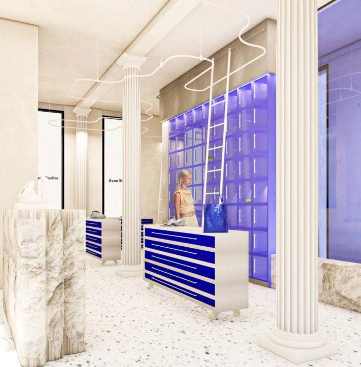 Una recepción moderna con columnas y un diseño en tonos azul y blanco.