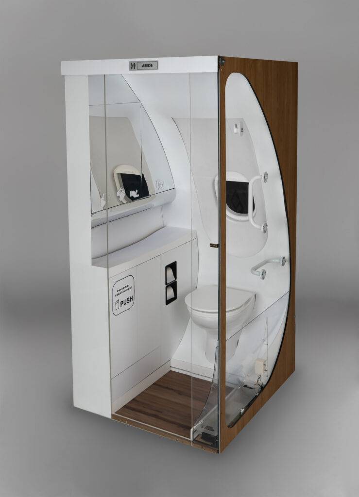 La imagen muestra un baño compacto con diseño moderno y accesible.
