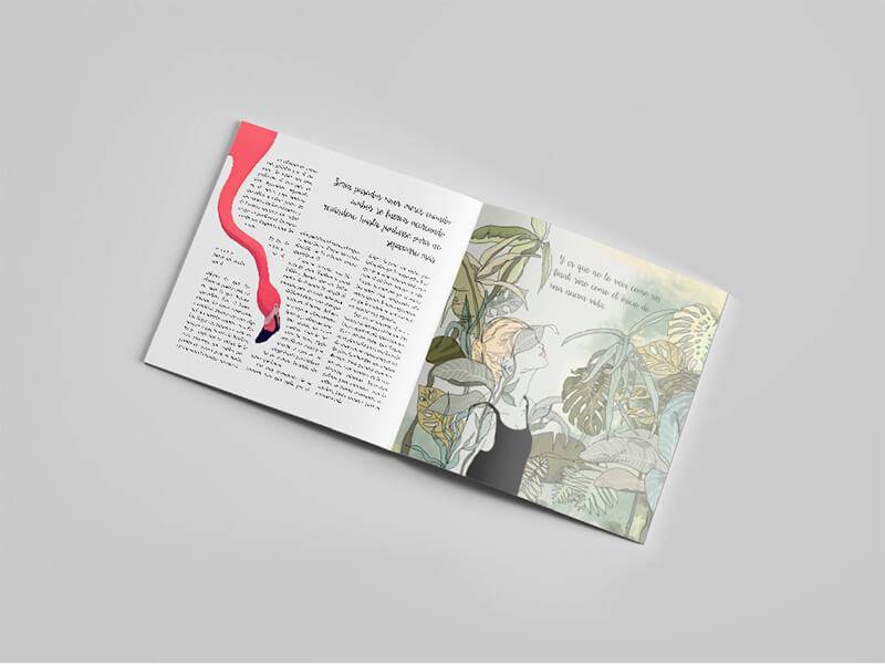 Un libro abierto con ilustraciones de plantas y un flamenco en una de sus páginas.