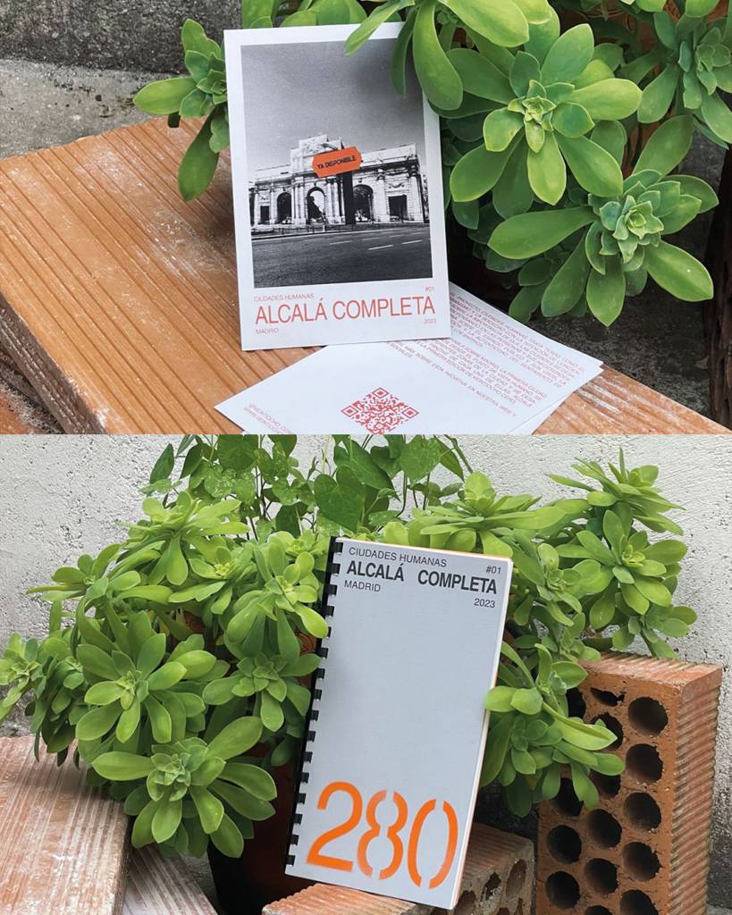 Una imagen que muestra una tarjeta con el texto 'ALCALÁ COMPLETA' sobre un fondo de plantas verdes.