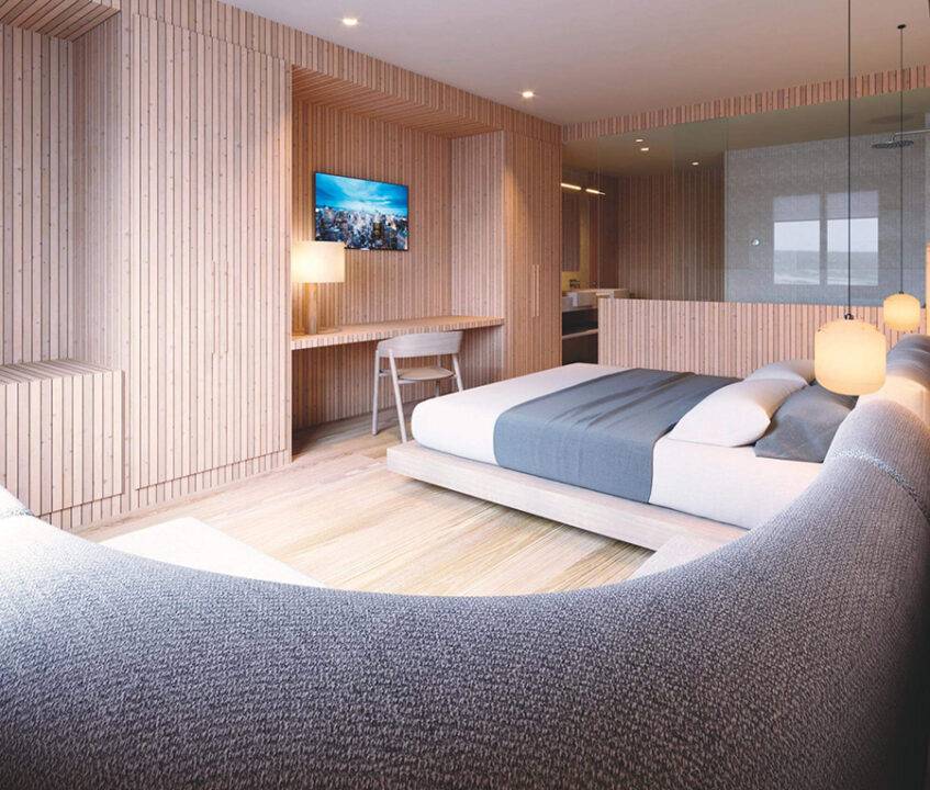 Una moderna habitación de hotel con paredes de madera y mobiliario minimalista.