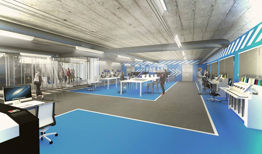 Una moderna sala de trabajo colaborativo con estaciones de computadora y espacio para la creatividad.