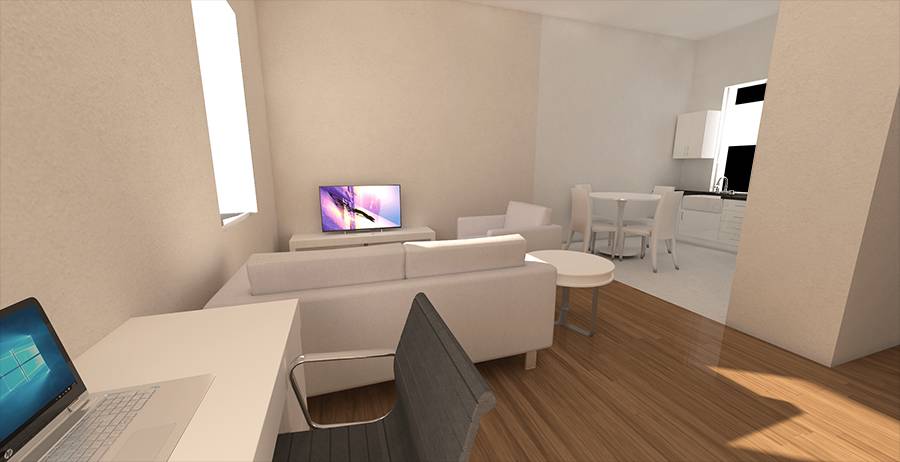 Una sala de estar moderna con un sofá blanco y una cocina integrada al fondo.