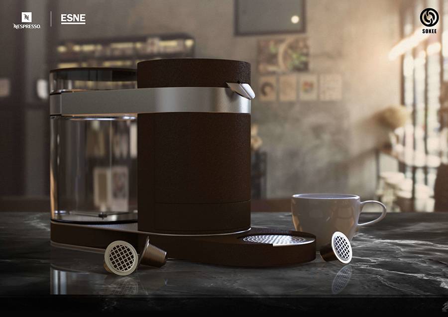 Una máquina de café Nespresso en una mesa con una taza y cápsulas.