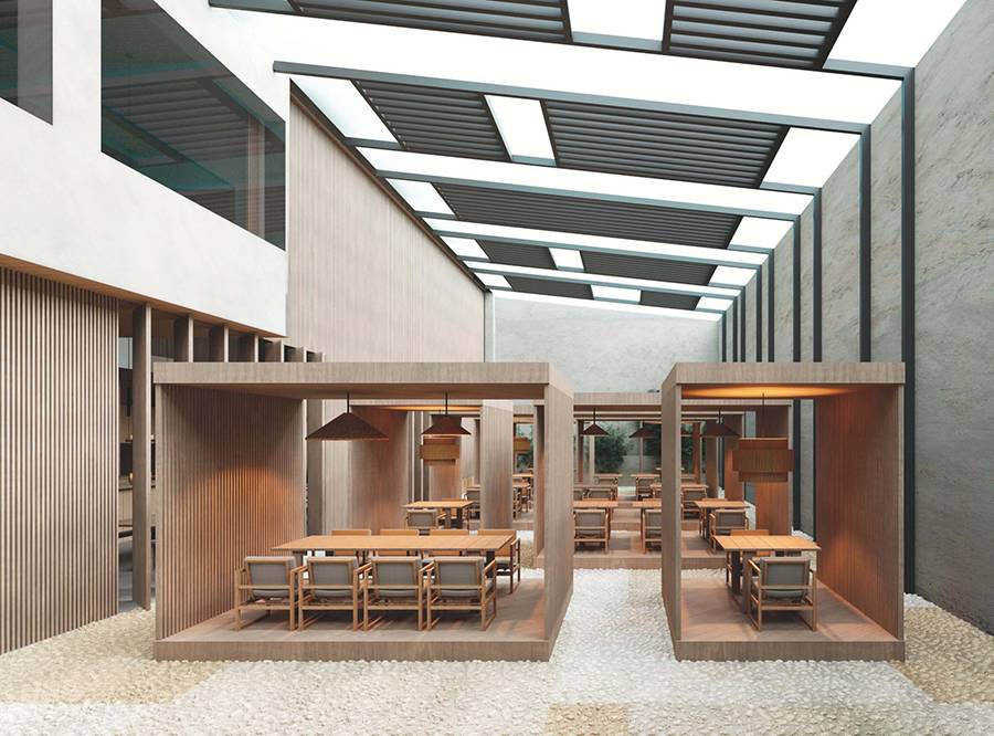 Un moderno diseño arquitectónico con espacios de comedor al aire libre y techos altos.