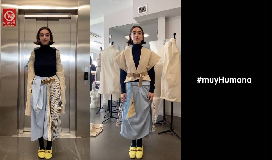 Una persona posa con un conjunto de moda en un ambiente de estudio.