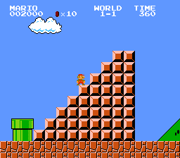Un personaje del videojuego Mario salta sobre bloques en un paisaje colorido.