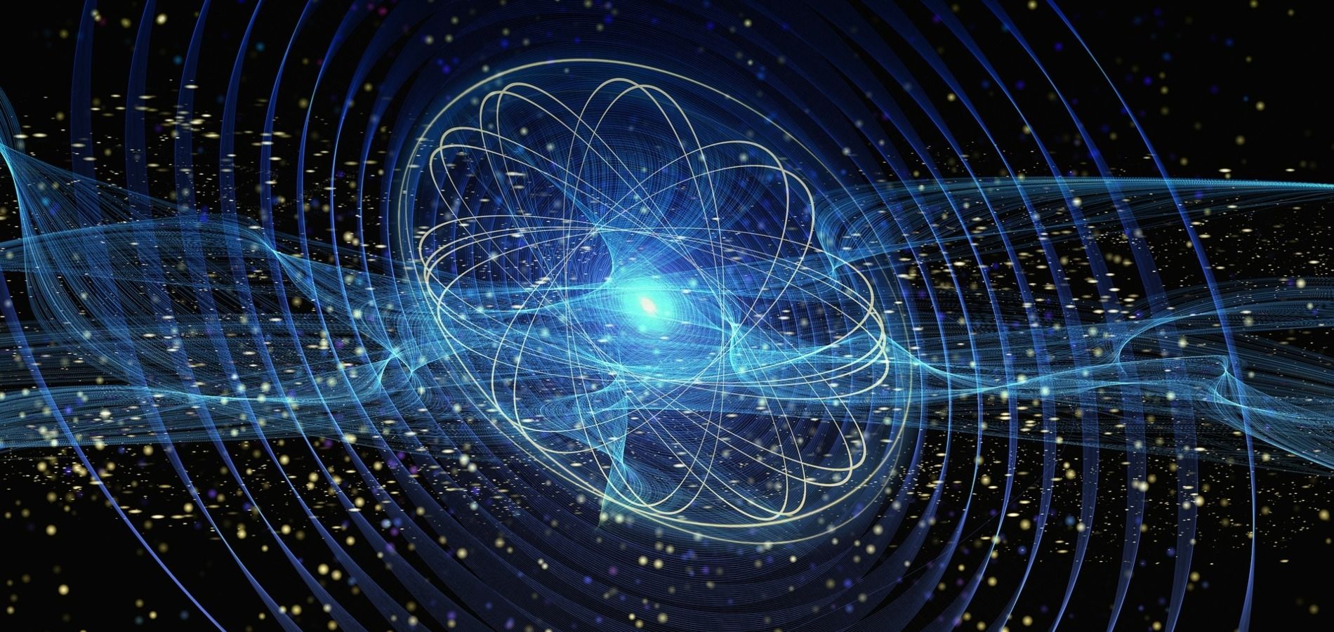La imagen representa un modelo abstracto de un átomo rodeado de ondas y partículas luminosas.