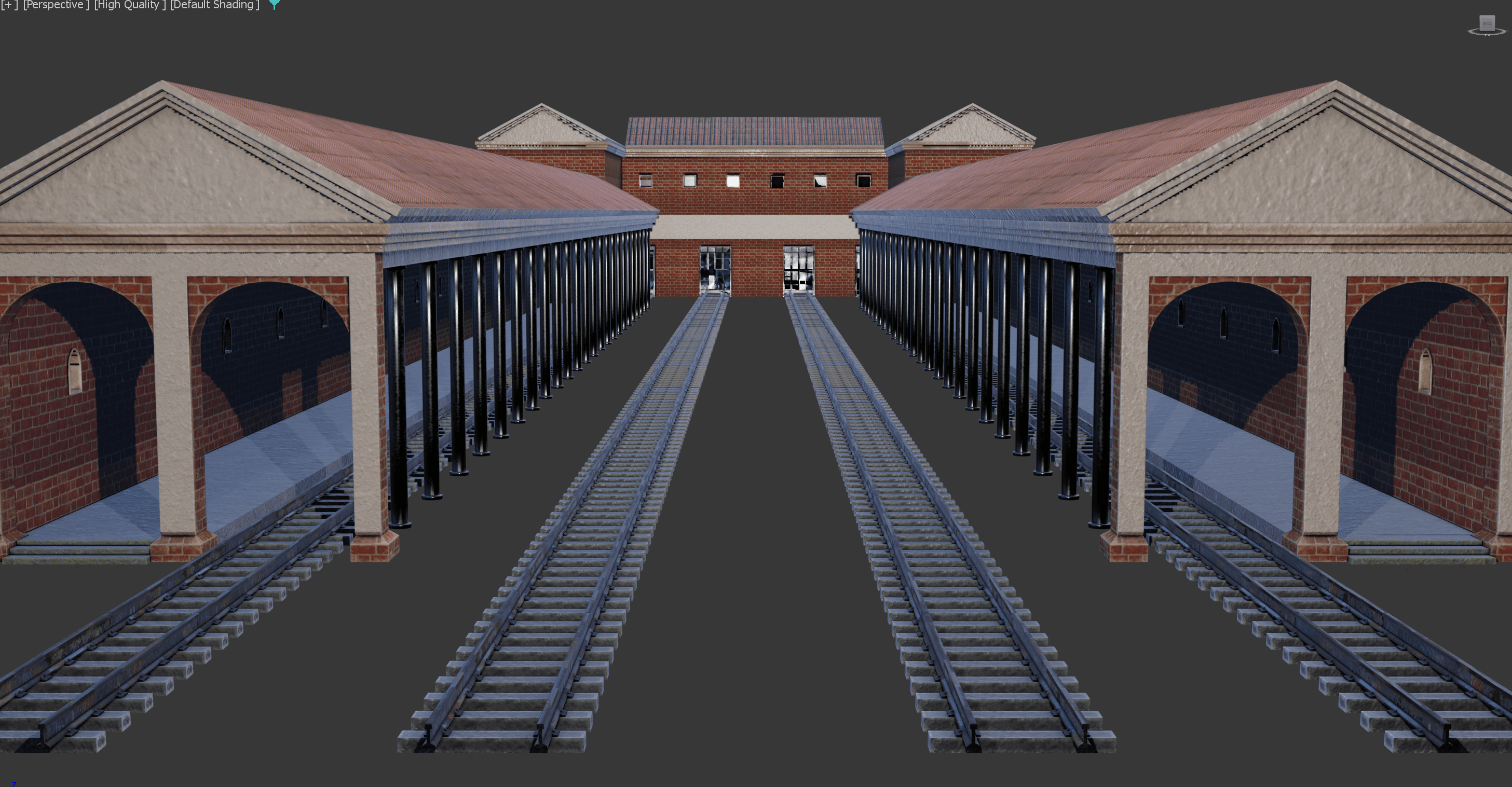 Una vista de un edificio de ferrocarril con varios andenes y vías en perspectiva.